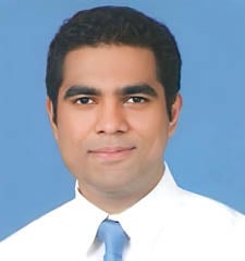 Headshot of Nizar Bhulani. 