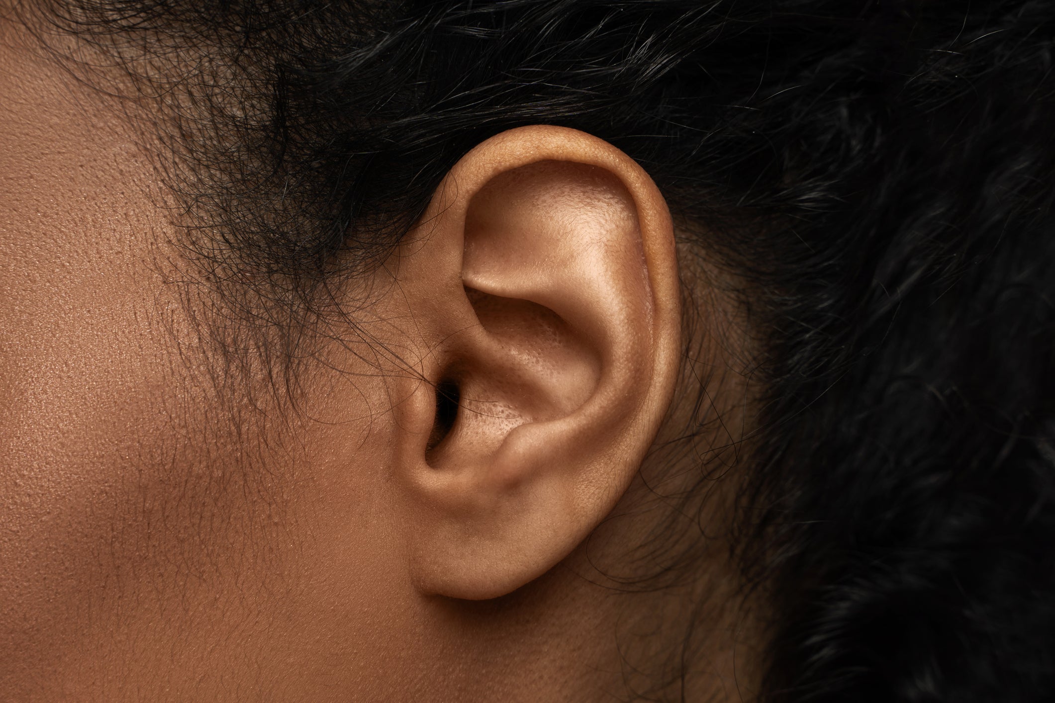 Closeup view of black female ear.