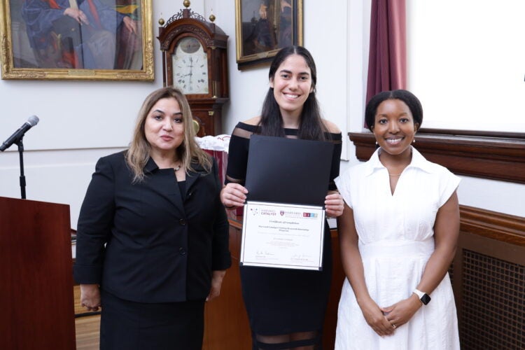 Elizabeth Carbonell with VRIP program staff Jessica St. Louis and Mary Francis Lopez at closing ceremony.