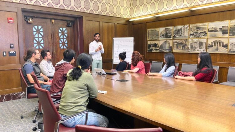 Mayank Chugh leading the Harvard Medical Postdoc Association board meeting.