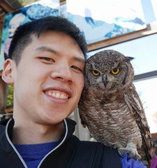 George Chao with an owl. 